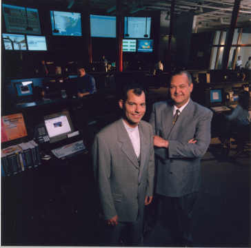 Dave Koch and Kyle Bacon in FNSI's Network Operations Center